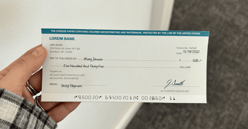 Example of a paper check with an MICR code at the bottom